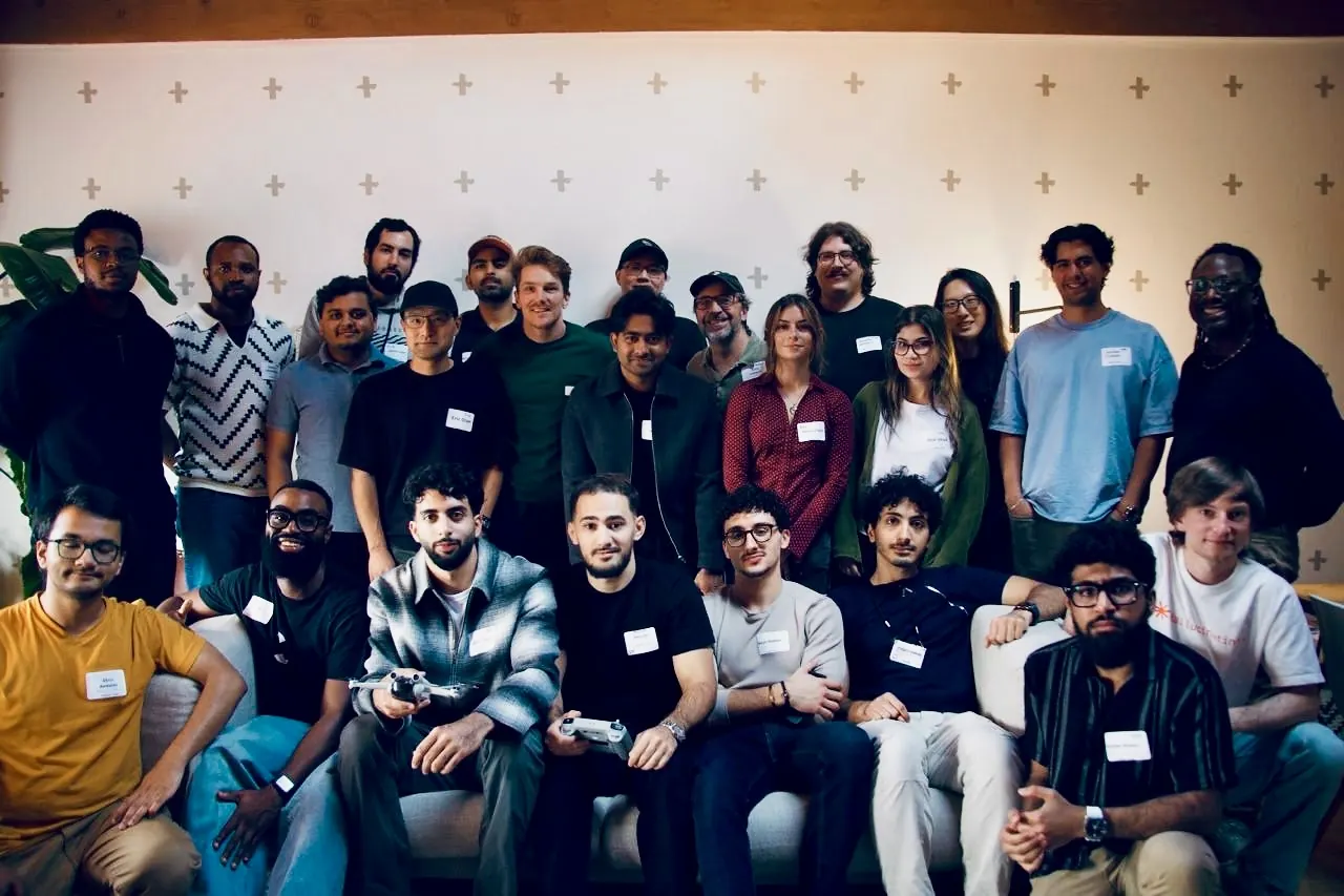 Builders gathered for a group photo at the OpenAI hackathon